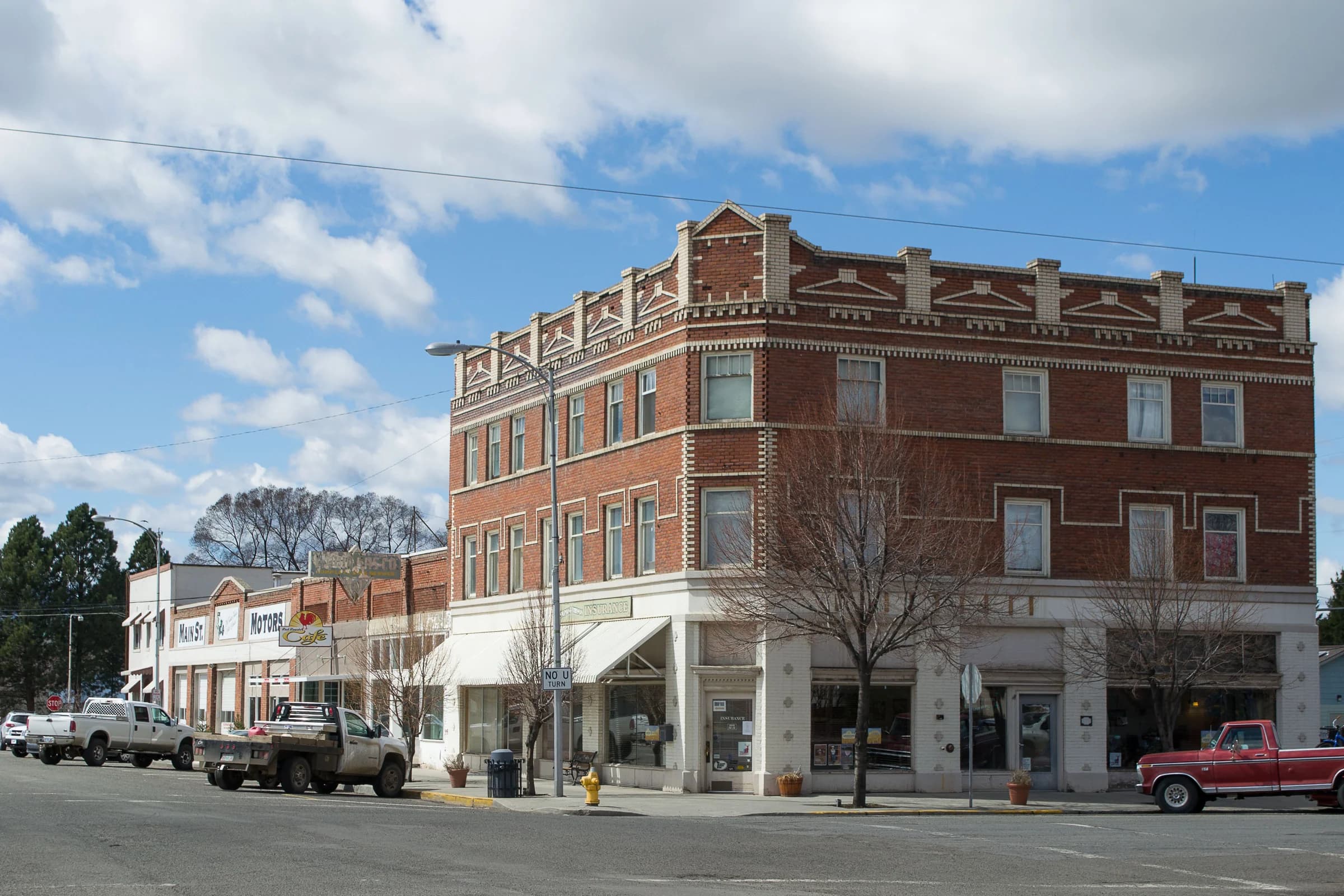 Enterprise’s downtown streetscape. Context photograph; the owner’s photographs of the EM&M itself are linked in the story.
