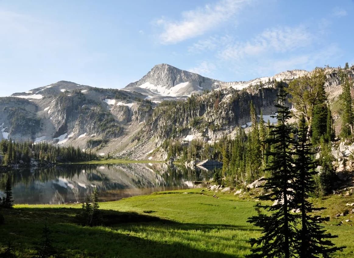 Mirror Lake in the Eagle Cap Wilderness. This is part of the broader mountain landscape connected to the county.
